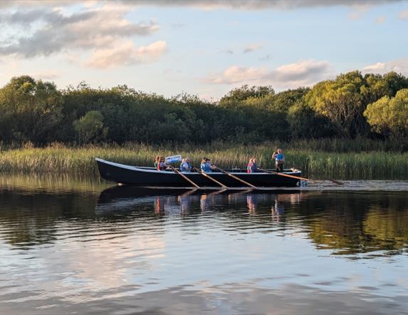 A 33ft currach being rowed on Lough Erne