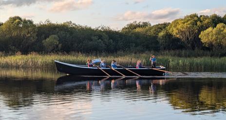 A 33ft currach being rowed on Lough Erne