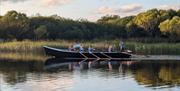 A 33ft currach being rowed on Lough Erne