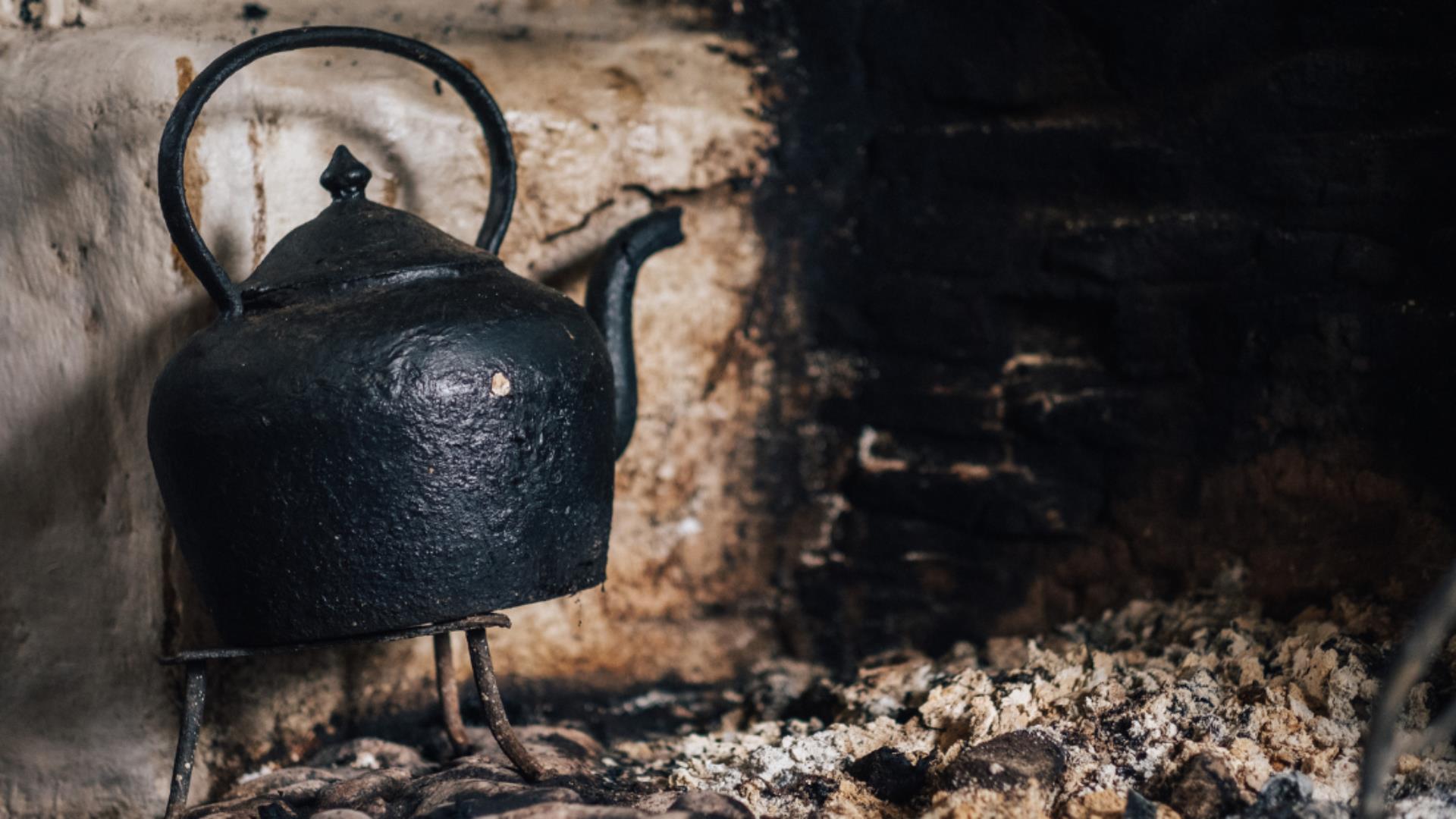 Image of a teapot on the hearth in a cottage at the Ulster American Folk Park Image of a teapot on the hearth in a cottage at the Ulster American Folk Park